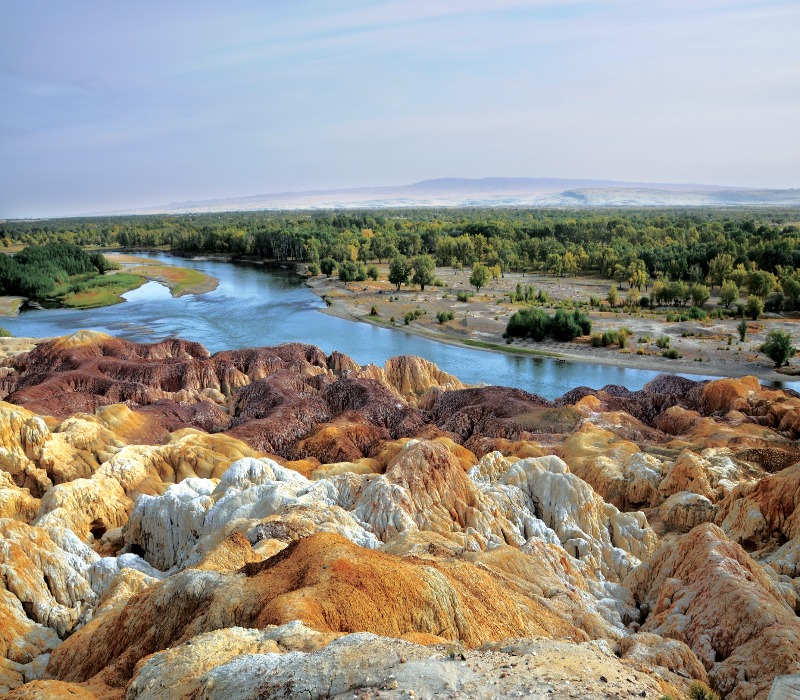 Panoramic mountain view overlooking a winding river.
