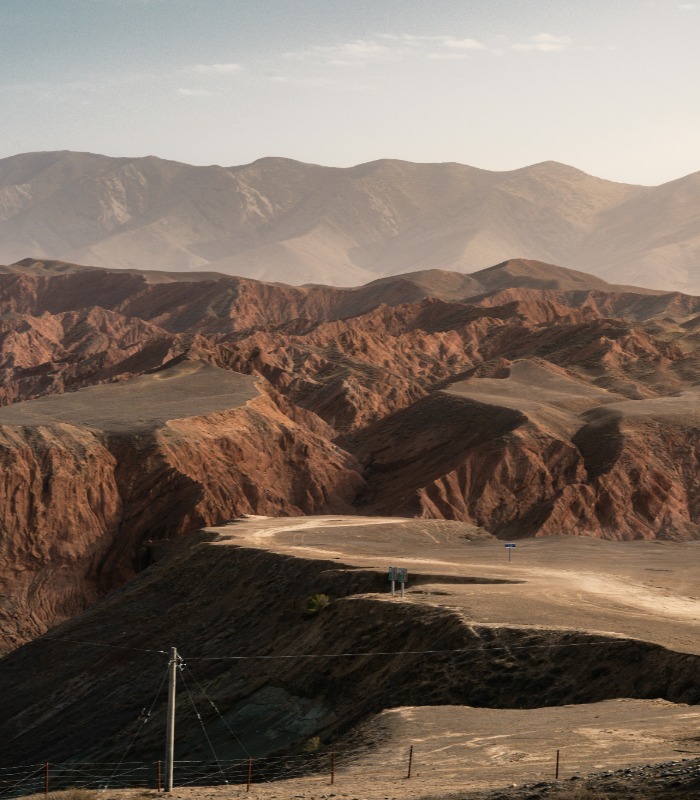 Spectacular layered rock formations inside a vast natural canyon.