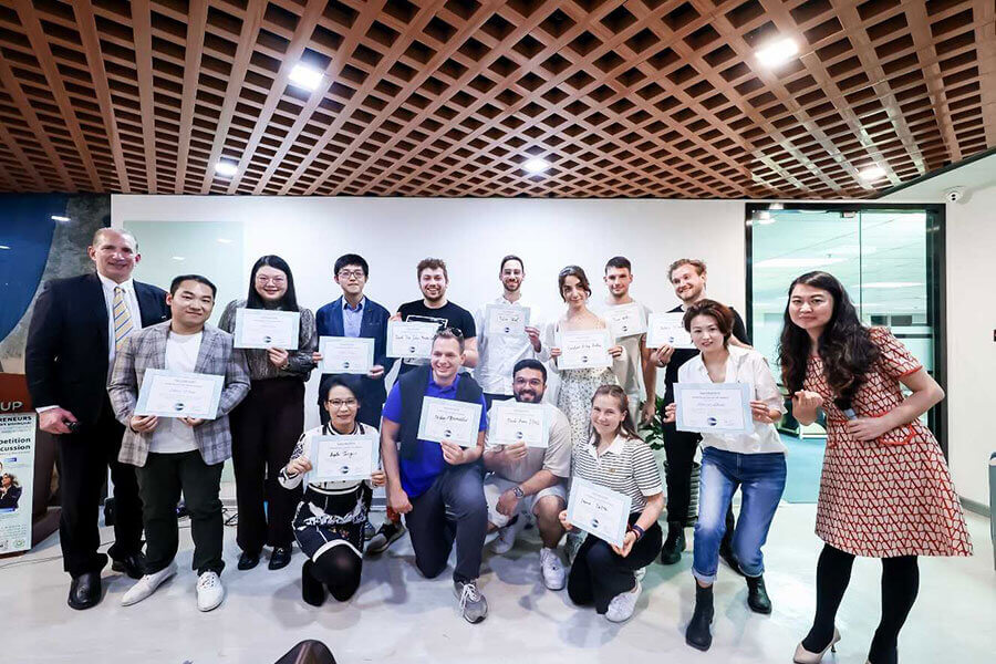 Student group on a guided China company visit in a specialized industry