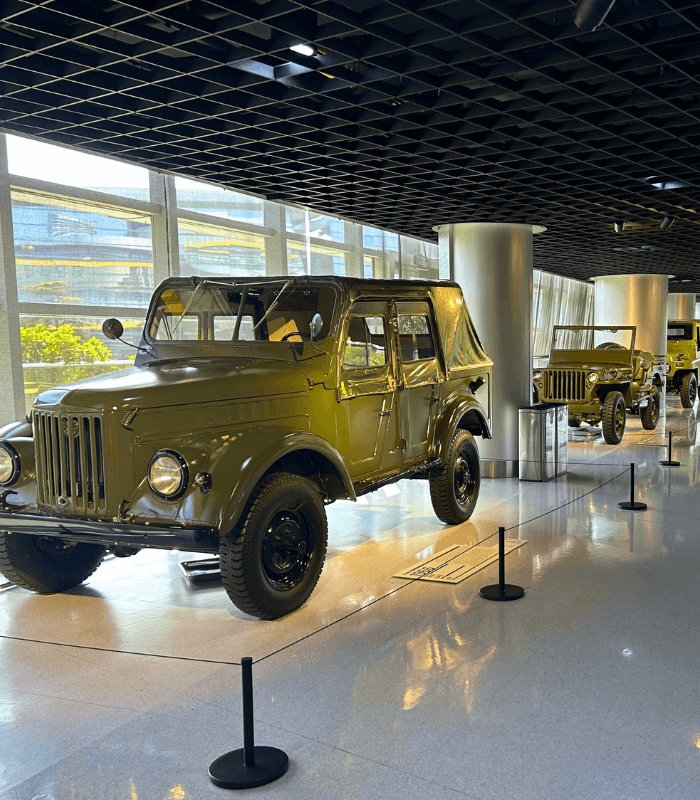 Green vintage car on display at Shanghai Auto Museum