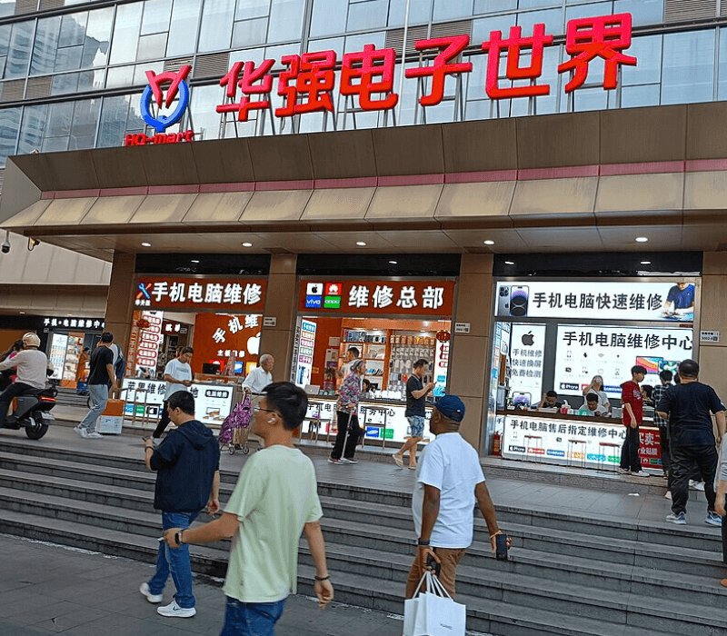 People sourcing electronic products outside Huaqiangbei building
