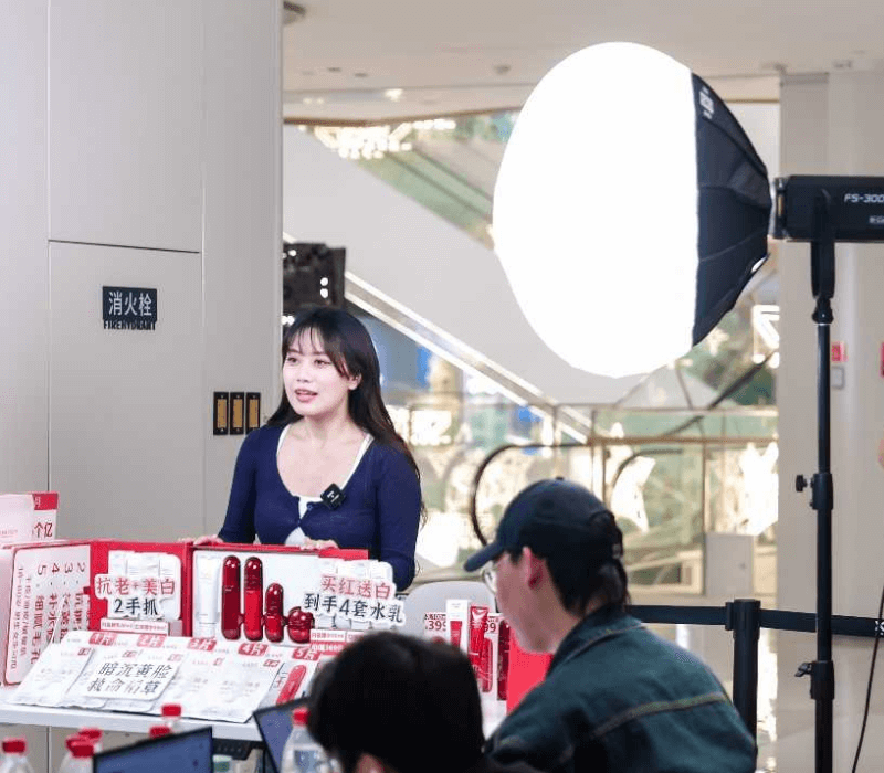 Livestreamer selling beauty products inside a livestreaming complex in China