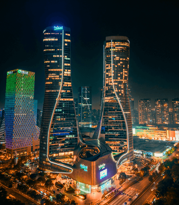 Raffles City Hangzhou illuminated at night in the central business district