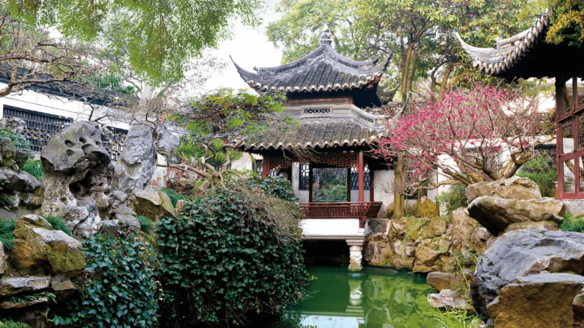 Peaceful Suzhou classical garden with pavilion, pond, and lush greenery