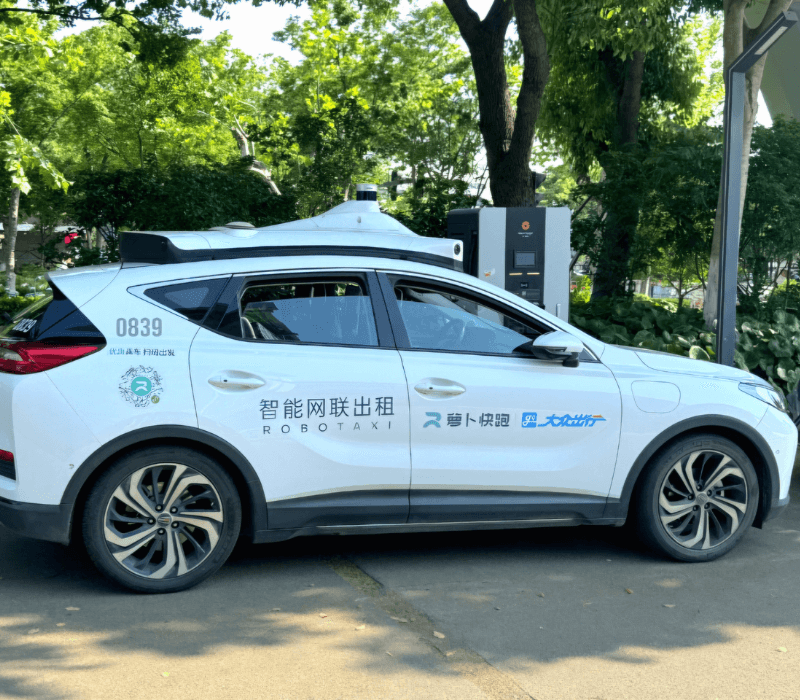 White autonomous robotaxi experience in Hangzhou